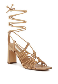 STRINGS ATTACHED BRAIDED BLOCK HEELED SANDAL