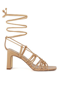 STRINGS ATTACHED BRAIDED BLOCK HEELED SANDAL